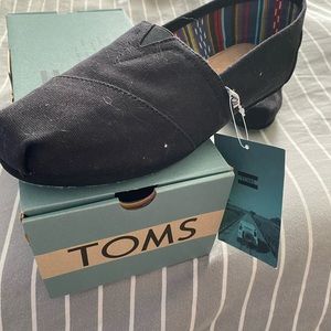 Brand NWT pair of Black Toms